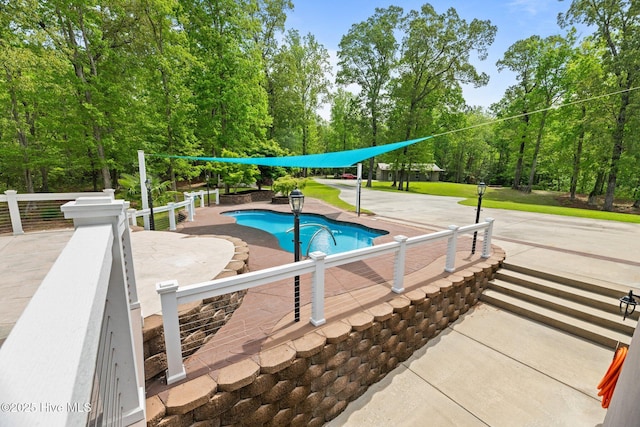 pool featuring a patio