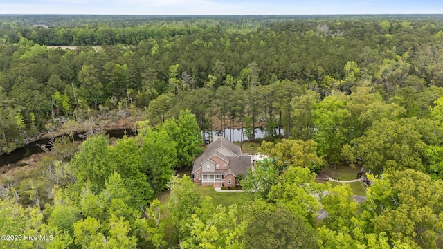 aerial view with a wooded view