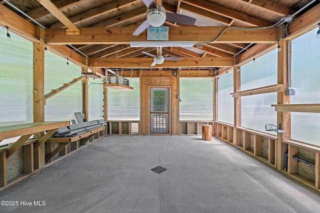 misc room featuring lofted ceiling, ceiling fan, and carpet floors