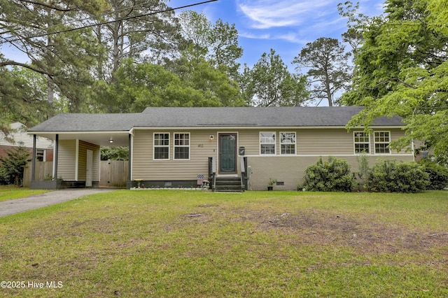 ranch-style home with an attached carport, a front yard, driveway, and crawl space