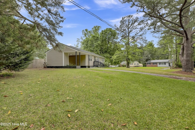 view of yard with fence