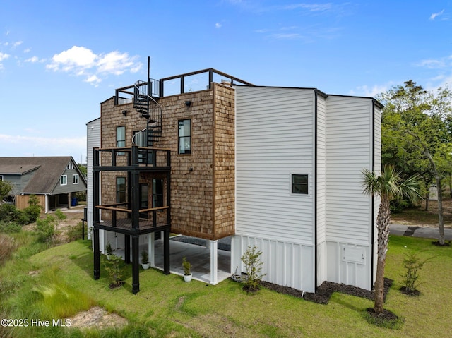 view of property exterior featuring a balcony