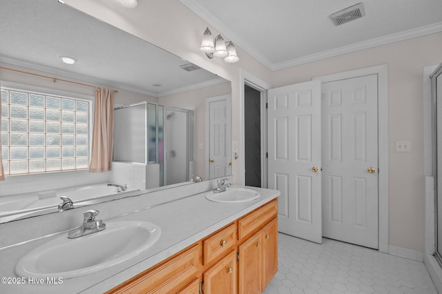 1114 Stone Creek Dr, Greenville, NC 27858 - full bath featuring a shower stall, a garden tub, double vanity, and crown molding