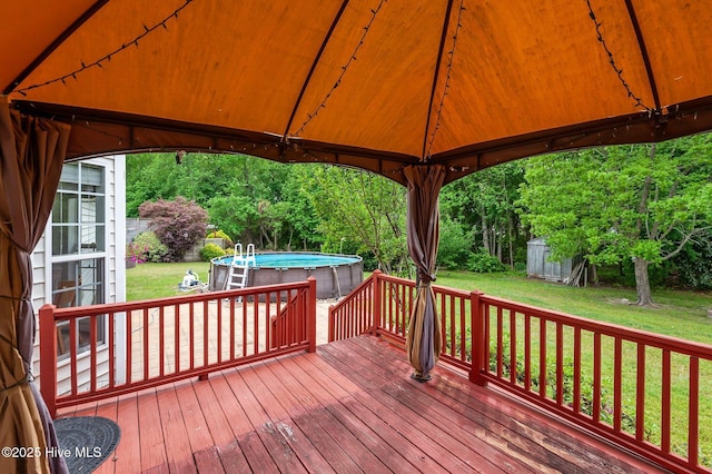 1114 Stone Creek Dr, Greenville, NC 27858 - wooden terrace with a gazebo, a lawn, and an outdoor pool
