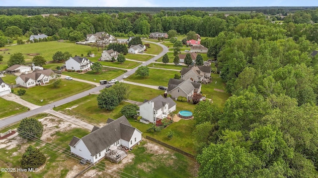 1114 Stone Creek Dr, Greenville, NC 27858 - aerial overview of property's location with a heavily wooded area and nearby suburban area