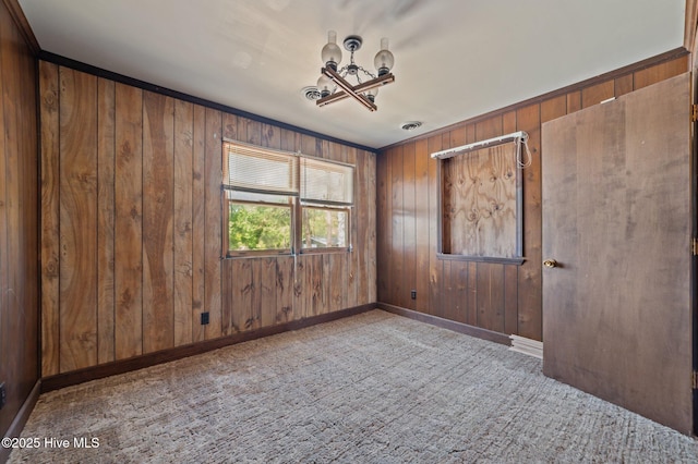 9952 US Highway 17 S, Vanceboro, NC 28586 - empty room featuring baseboards, wood walls, carpet, and visible vents