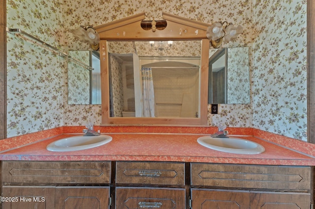 9952 US Highway 17 S, Vanceboro, NC 28586 - full bath with a sink, wallpapered walls, and double vanity