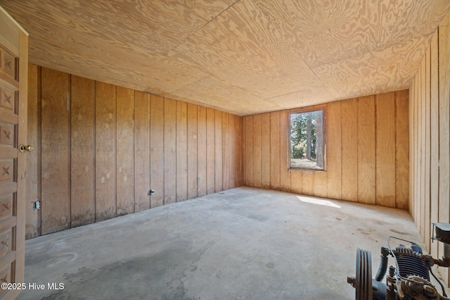9952 US Highway 17 S, Vanceboro, NC 28586 - spare room with unfinished concrete floors, wood ceiling, and wooden walls