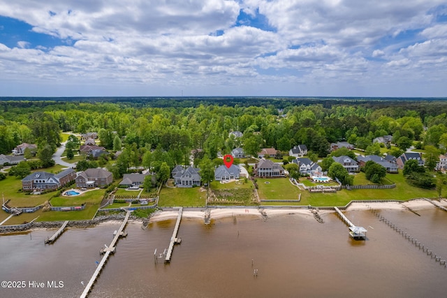 228 Drake Lndg, New Bern, NC 28560 - aerial view of residential area featuring a heavily wooded area and a nearby body of water