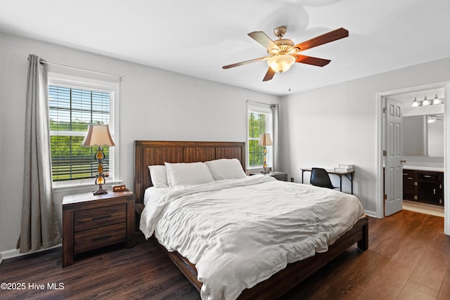 bedroom with dark wood finished floors, baseboards, and a ceiling fan