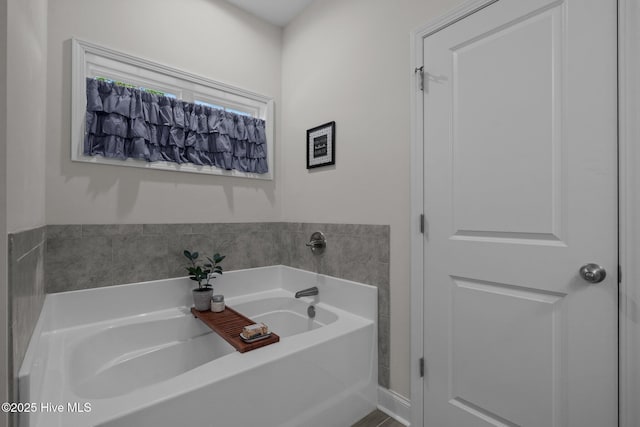 full bath featuring a bath