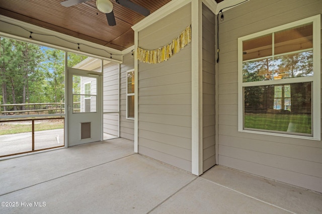 exterior space featuring ceiling fan