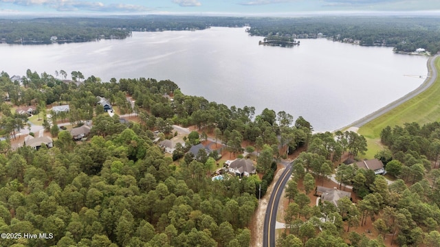 aerial view with a water view, a residential view, and a wooded view