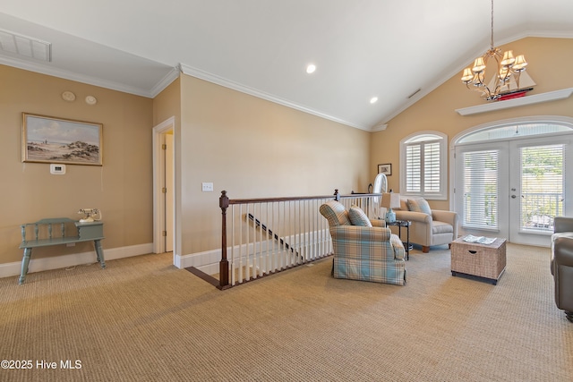 107 Waterway Crossing Ct, Little River, SC 29566 - living room with a chandelier, light colored carpet, crown molding, french doors, and baseboards
