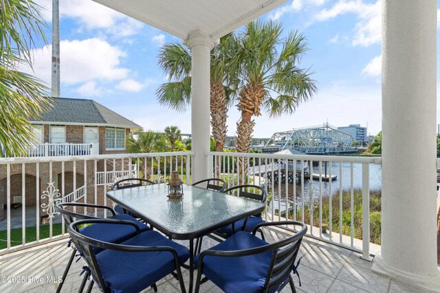 107 Waterway Crossing Ct, Little River, SC 29566 - balcony with a water view and outdoor dining area