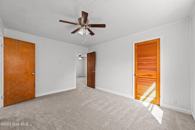 480 Croatan St, Belhaven, NC 27810 - unfurnished bedroom featuring crown molding, ceiling fan, and carpet flooring