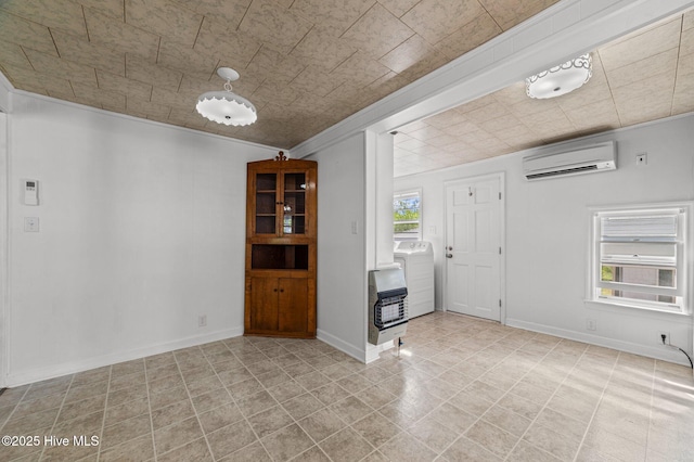 480 Croatan St, Belhaven, NC 27810 - tiled foyer entrance with crown molding, heating unit, washer / dryer, baseboards, and a wall mounted AC