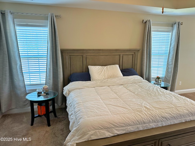 bedroom with light carpet
