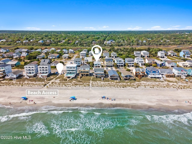 bird's eye view with a view of the beach, a residential view, and a water view