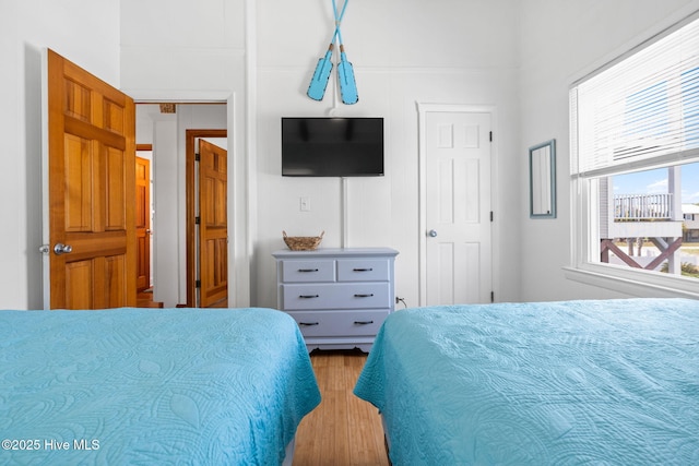 bedroom with wood finished floors