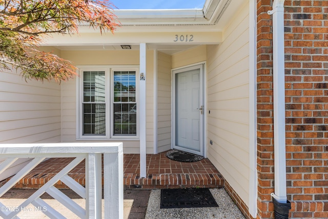 3012 Remington Dr, Wilmington, NC 28405 - entrance to property with brick siding