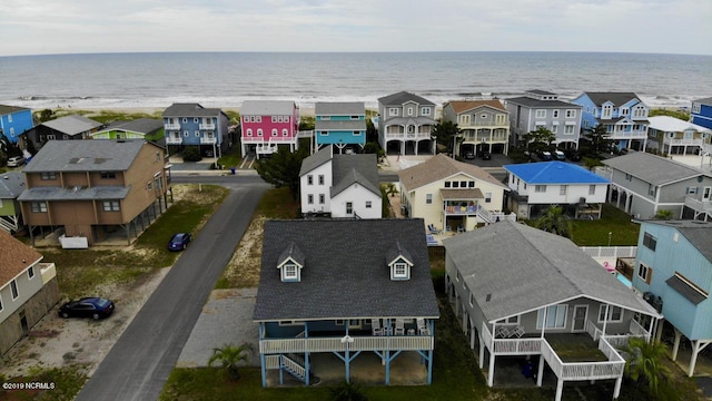 bird's eye view with a water view and a residential view