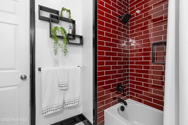 bathroom with shower / tub combo with curtain