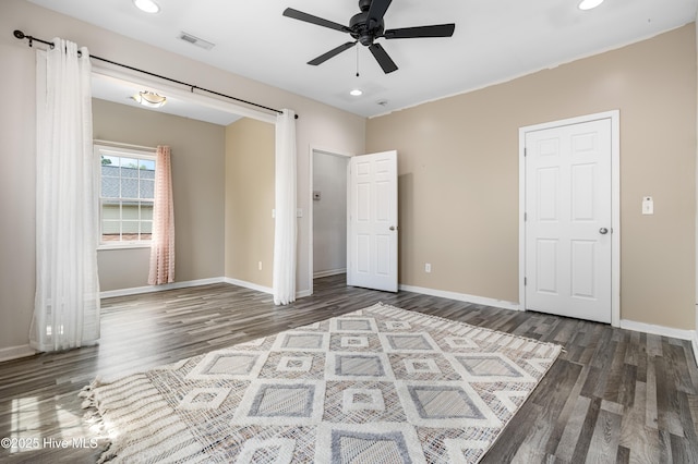 unfurnished bedroom featuring recessed lighting, visible vents, and wood finished floors