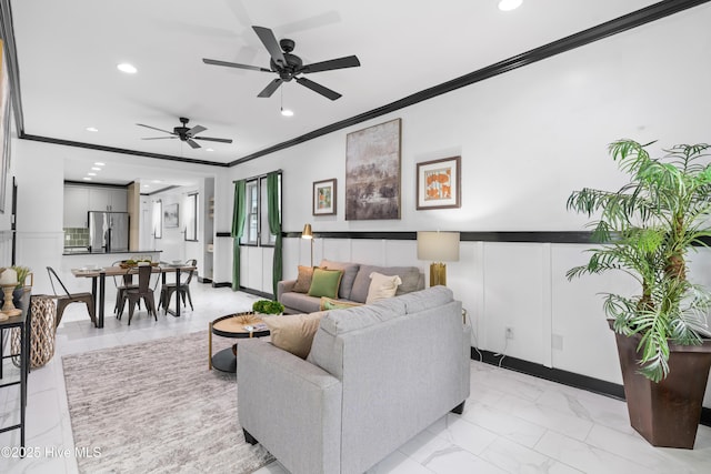 living room featuring recessed lighting, marble finish floor, a wainscoted wall, ceiling fan, and crown molding
