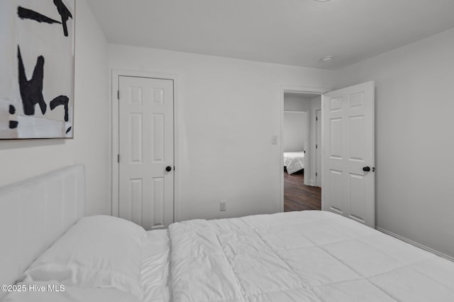 1107 Adams St N, Wilson, NC 27893 - bedroom featuring dark wood-style flooring