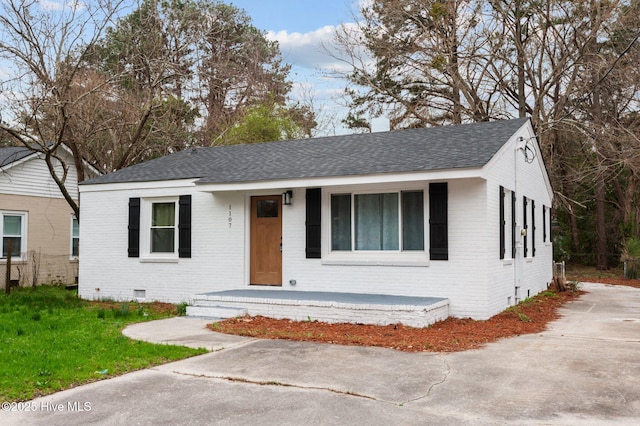 1107 Adams St N, Wilson, NC 27893 - single story home with brick siding, crawl space, roof with shingles, and a front yard