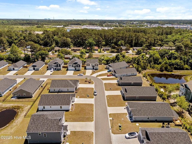aerial view featuring a water view and a residential view