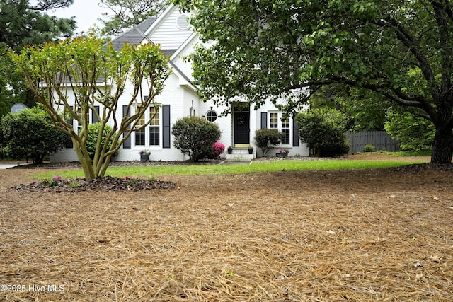 obstructed view of property featuring fence