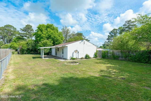view of yard with a patio and a fenced backyard