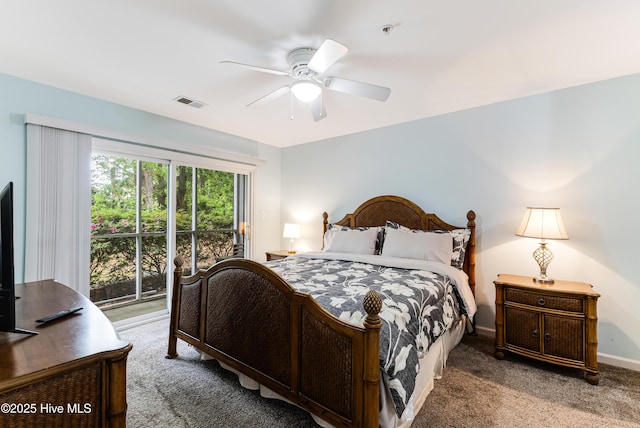 carpeted bedroom featuring baseboards, visible vents, and ceiling fan
