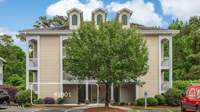 view of front of home featuring uncovered parking