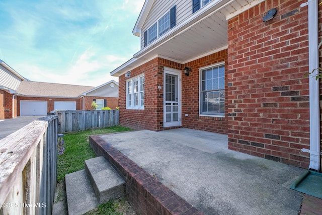 view of patio / terrace featuring fence