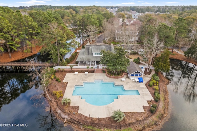 9148 E Lake Rd, Calabash, NC 28467 - view from above of property featuring a pool area and a large body of water