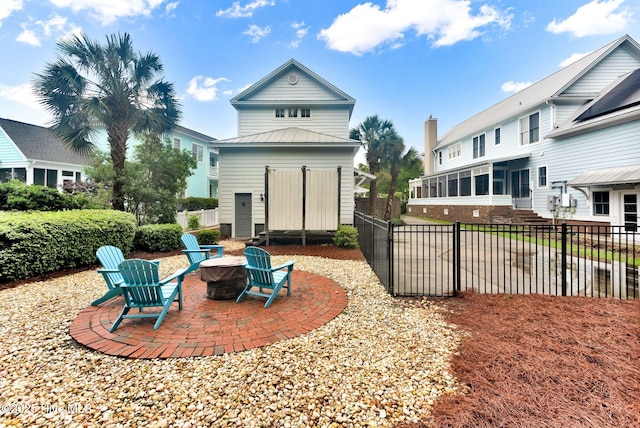 back of house with fence and a patio area