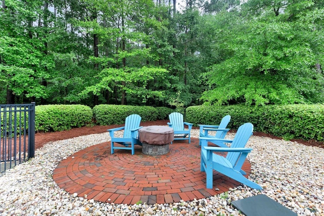 view of patio featuring an outdoor fire pit