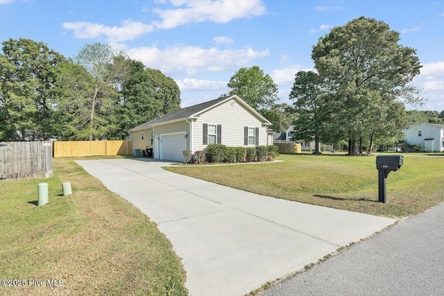 view of front of house featuring an attached garage, a front lawn, fence, and concrete driveway