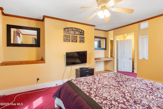 carpeted bedroom with ornamental molding, ceiling fan, and baseboards