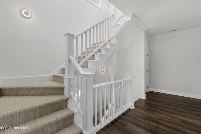 768 S Lumina Ave, Wrightsville Beach, NC 28480 - stairs featuring wood finished floors, baseboards, and ornamental molding