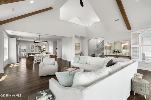 768 S Lumina Ave, Wrightsville Beach, NC 28480 - living room featuring beamed ceiling, stairs, baseboards, dark wood-style flooring, and high vaulted ceiling