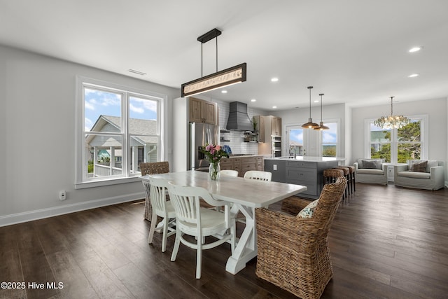768 S Lumina Ave, Wrightsville Beach, NC 28480 - dining room featuring plenty of natural light, dark wood finished floors, recessed lighting, and a chandelier