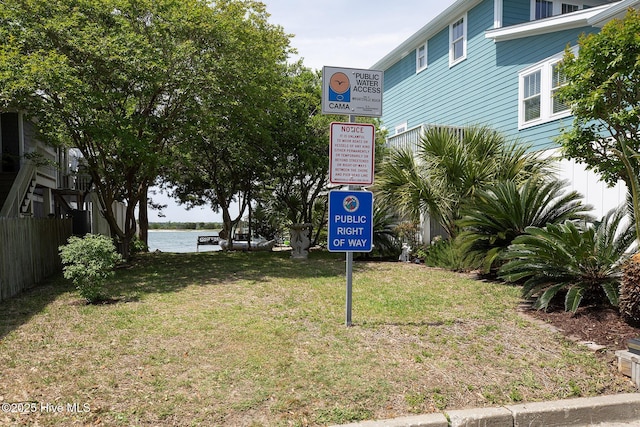 768 S Lumina Ave, Wrightsville Beach, NC 28480 - surrounding community featuring a yard and a water view