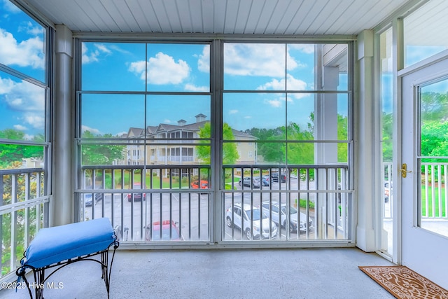 290 Woodlands Way Unit 10, Calabash, NC 28467 - unfurnished sunroom with floor to ceiling windows and speckled floor