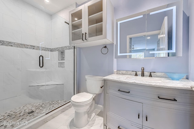 290 Woodlands Way Unit 10, Calabash, NC 28467 - full bathroom with toilet, vanity, a stall shower, marble finish floors, and baseboards