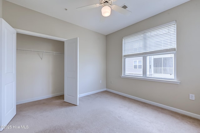 290 Woodlands Way Unit 10, Calabash, NC 28467 - unfurnished bedroom with carpet, a closet, and ceiling fan