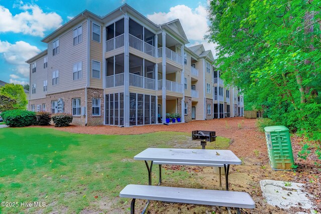 290 Woodlands Way Unit 10, Calabash, NC 28467 - view of property's community with a lawn